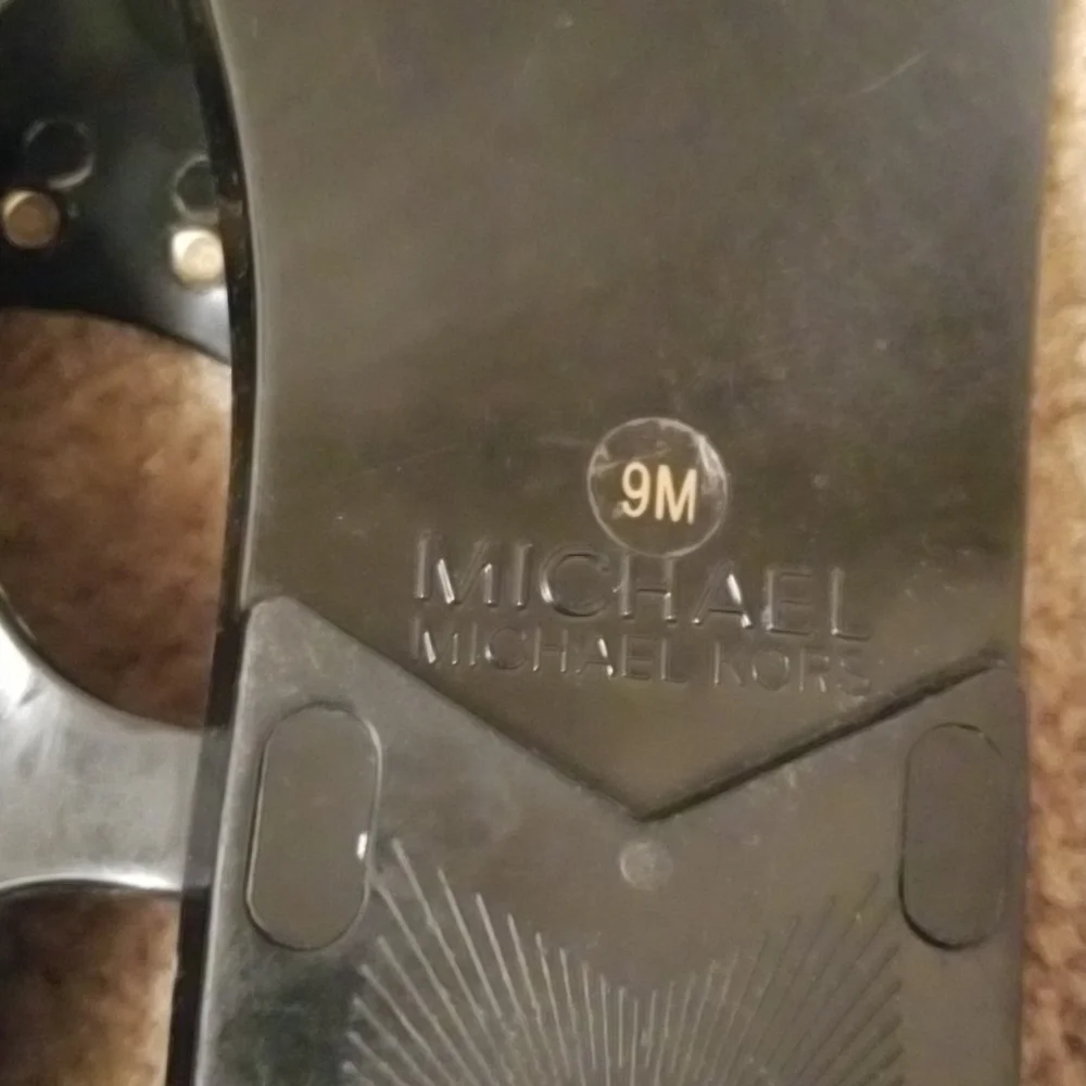 Michael Kors Black Jelly Thong Sandals with Gold Padlock Accent